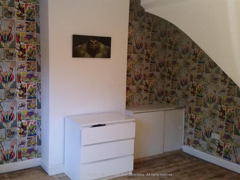 marvel wallpaper in bedroom by fresh start decorators